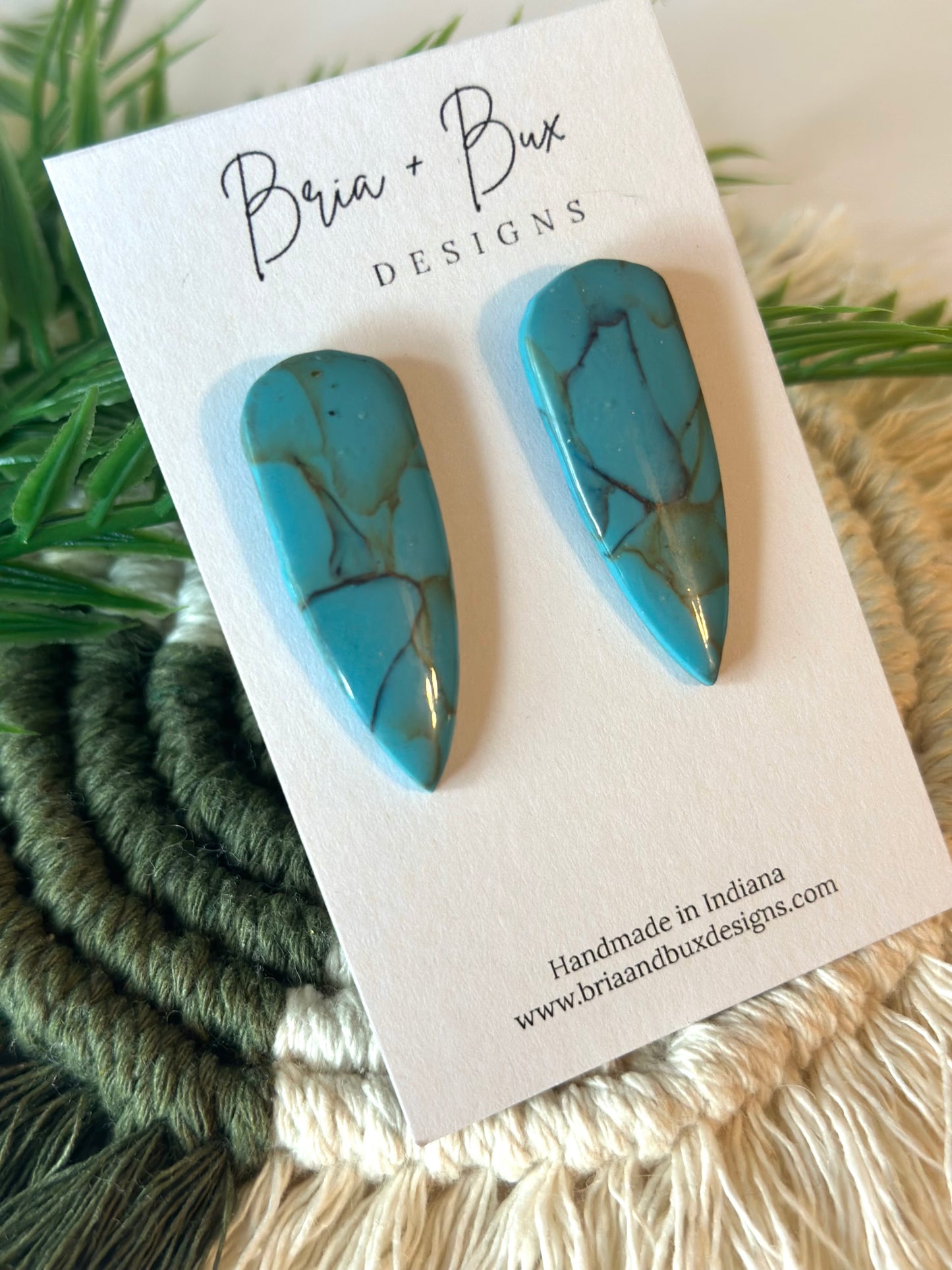 dagger studs in faux turquoise gloss