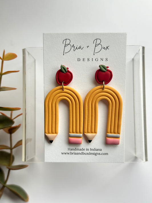 arched pencil dangles