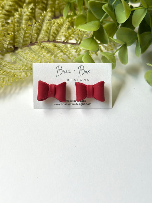small bow studs in red
